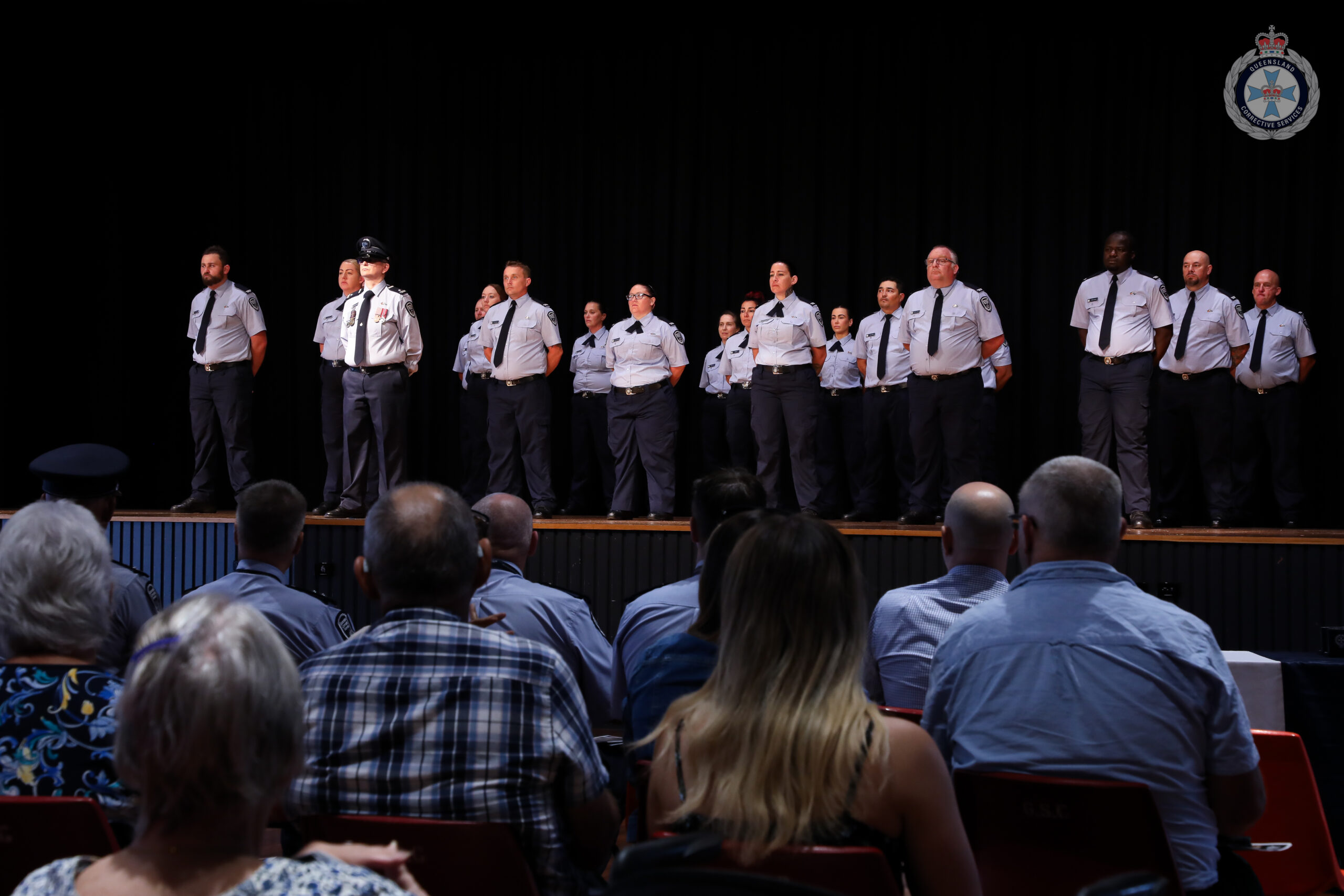 Friends and family look on as custodial correctional officers graduate 