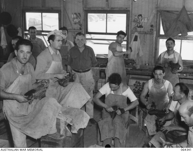 H Lovell Of 22nd Garrison Battalion Who Is In Charge Of These Italian Bootmakers At The 12th Australian Prisoner Of War Camp